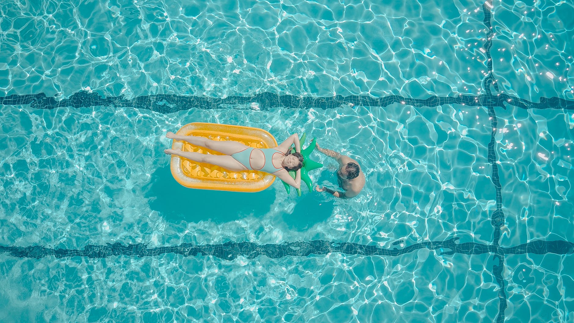 top view of people in the swimming pool